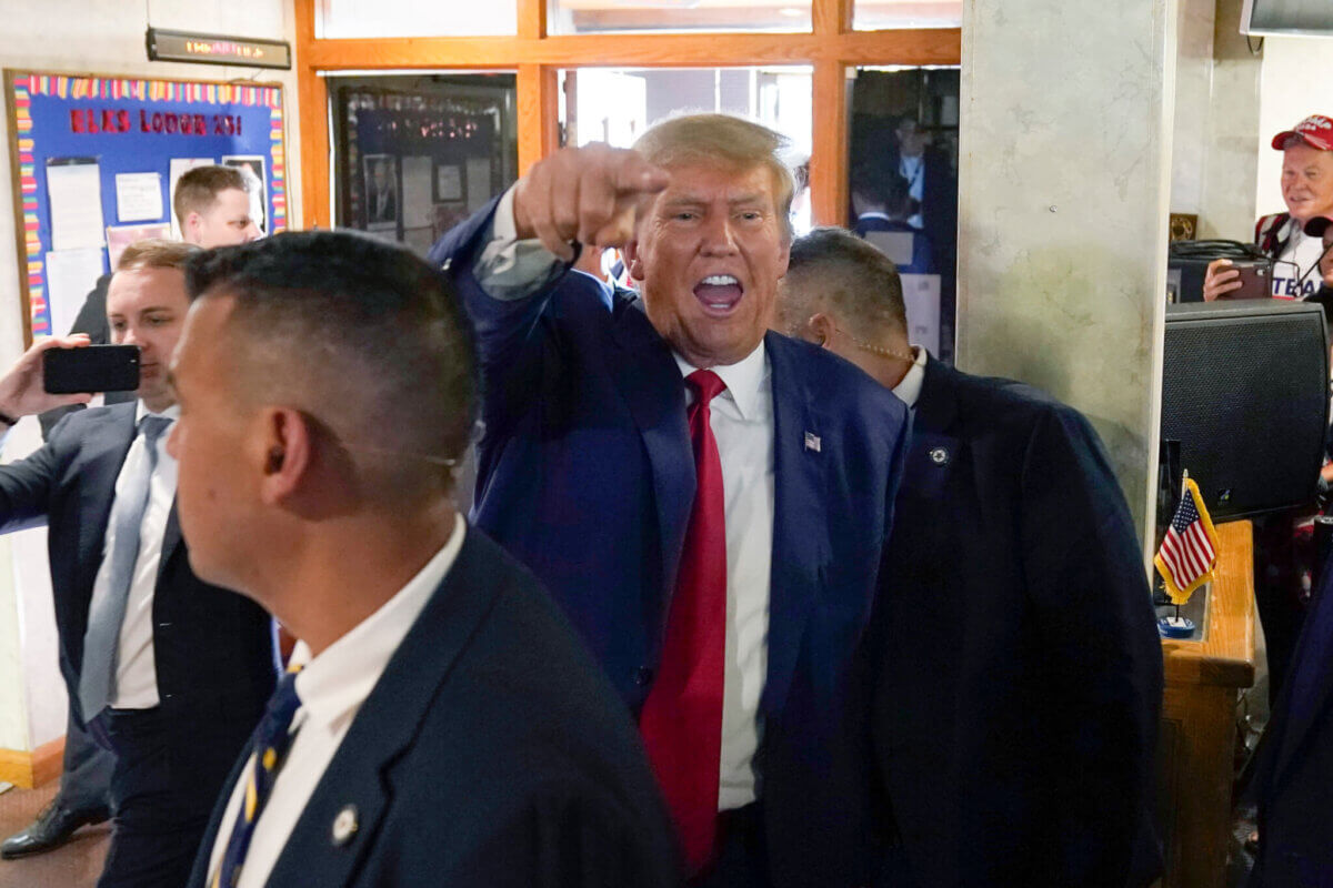 Former President Donald Trump departs after a visit with campaign volunteers at the Elks Lodge, Tuesday, July 18, 2023, in Cedar Rapids, Iowa. (AP Photo/Charlie Neibergall)
