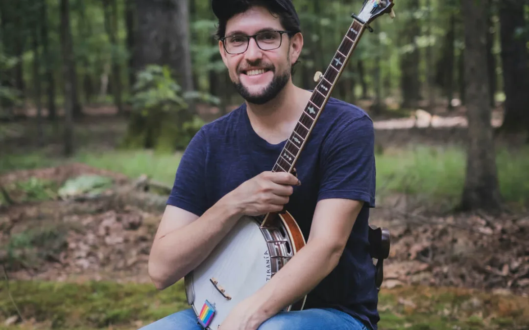 Meet the Grammy-Nominated NC Musician Who Played For Protesters at Louis DeJoy’s Home