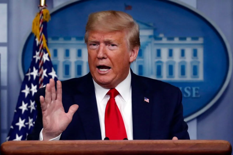 Black patient waiting in hallway of hospital during COVID-19 pandemic