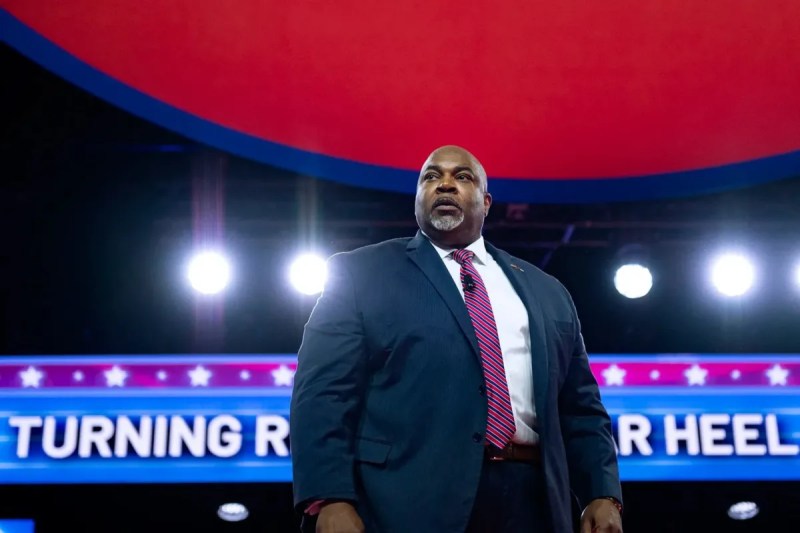 Mark Robinson stands on stage at the Conservative Political Action Conference in National Harbor, Maryland, in February 2024. (ZACH ROBERTS/NURPHOTO/AP)