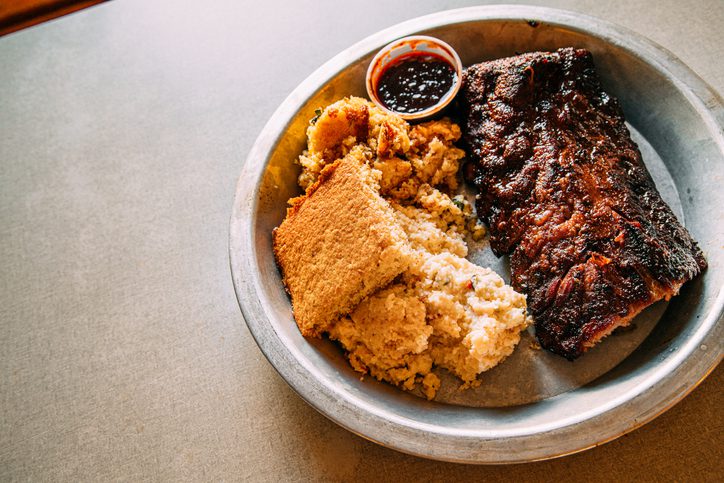 Delicious Half Rack of Ribs, Cornbread, and Corn Pudding for a Savory Lunch in Asheville, North Carolina