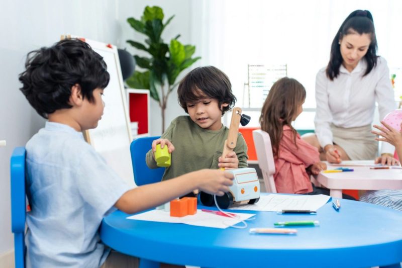 Children playing at a table.
