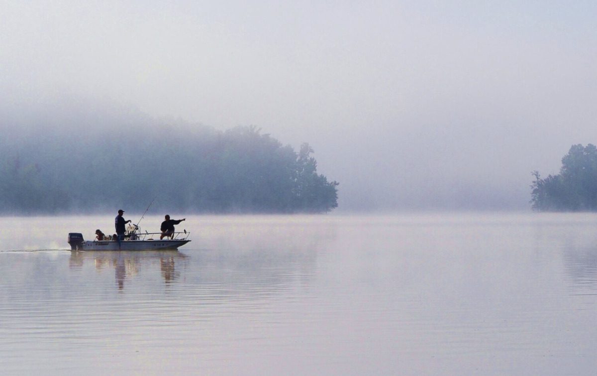 People fishing in a boat at Kerr Lake