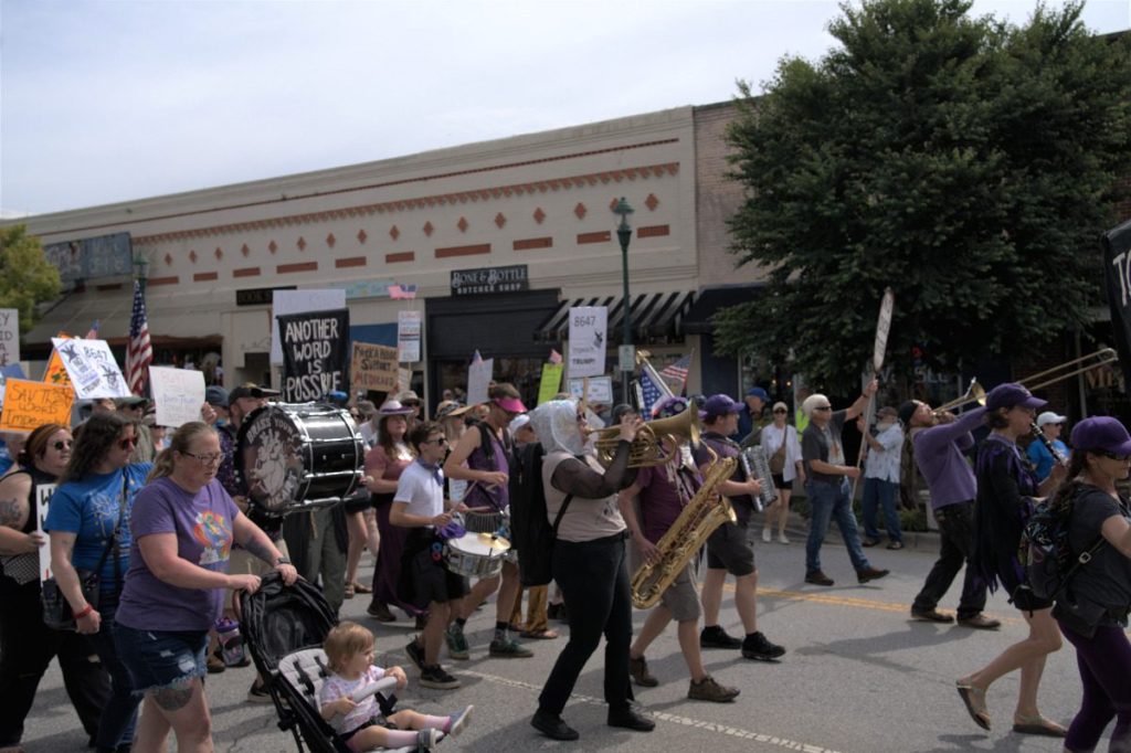 Woman banned from Chuck Edwards’ McDonald’s after marching band protest