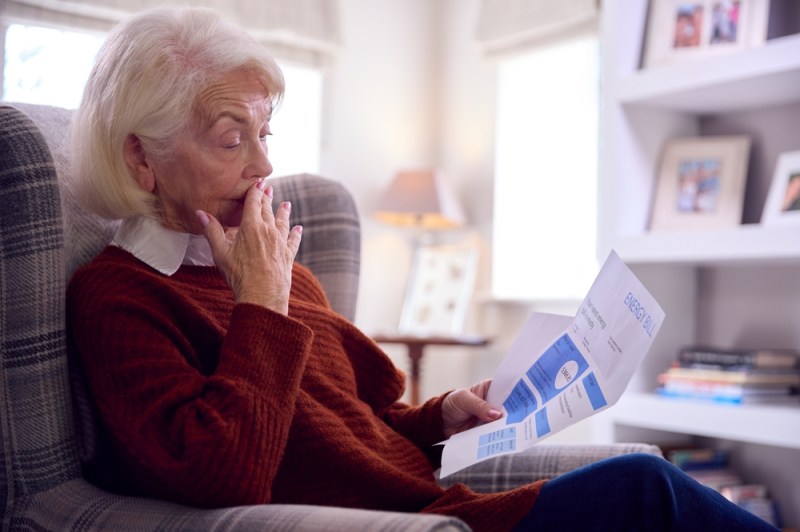 Photo of a older woman worried about her electric bill