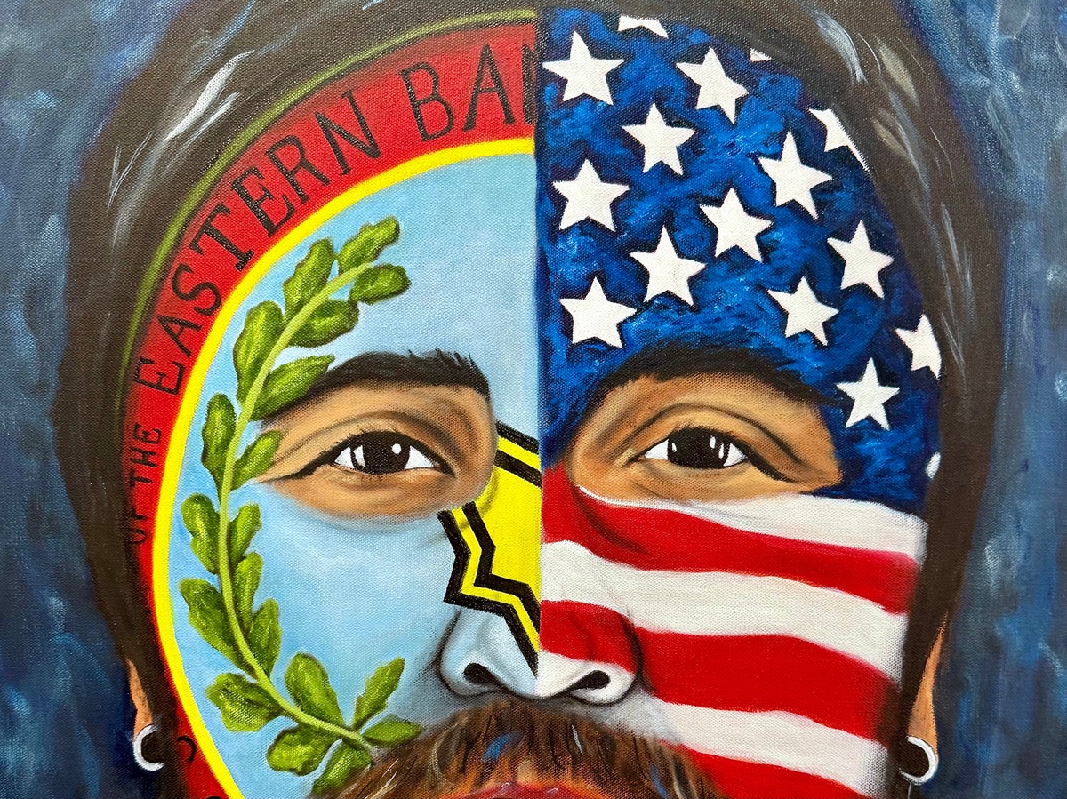 Aaron Lambert’s painting, “American Indian" shows a man with the Cherokee Seal painted on one side of his face and the American flag on the other