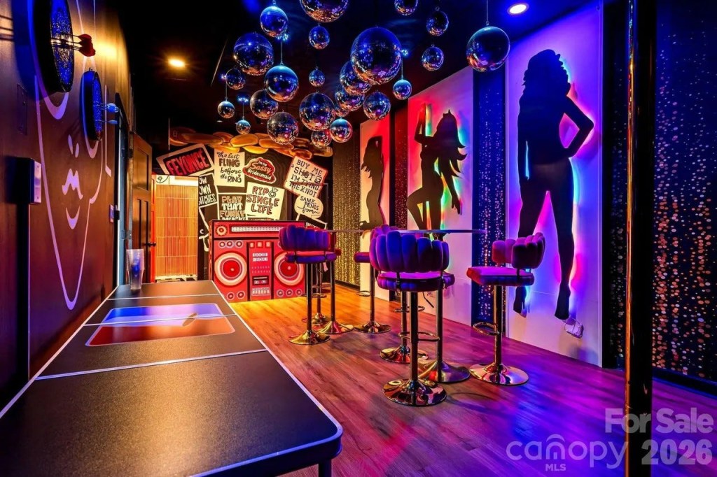 This Asheville ‘bachelorette pad’ includes a stripper pole, DJ booth