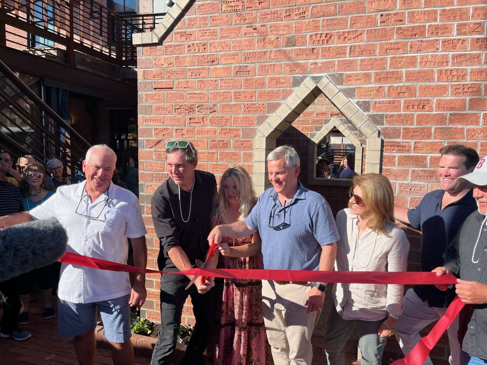 Gov. Josh Stein visits Marshall's community art piece 2 years after Helene