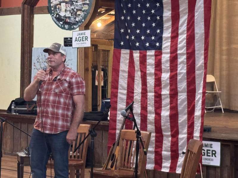 Jamie Ager speaks to a crowd in Hendersonville