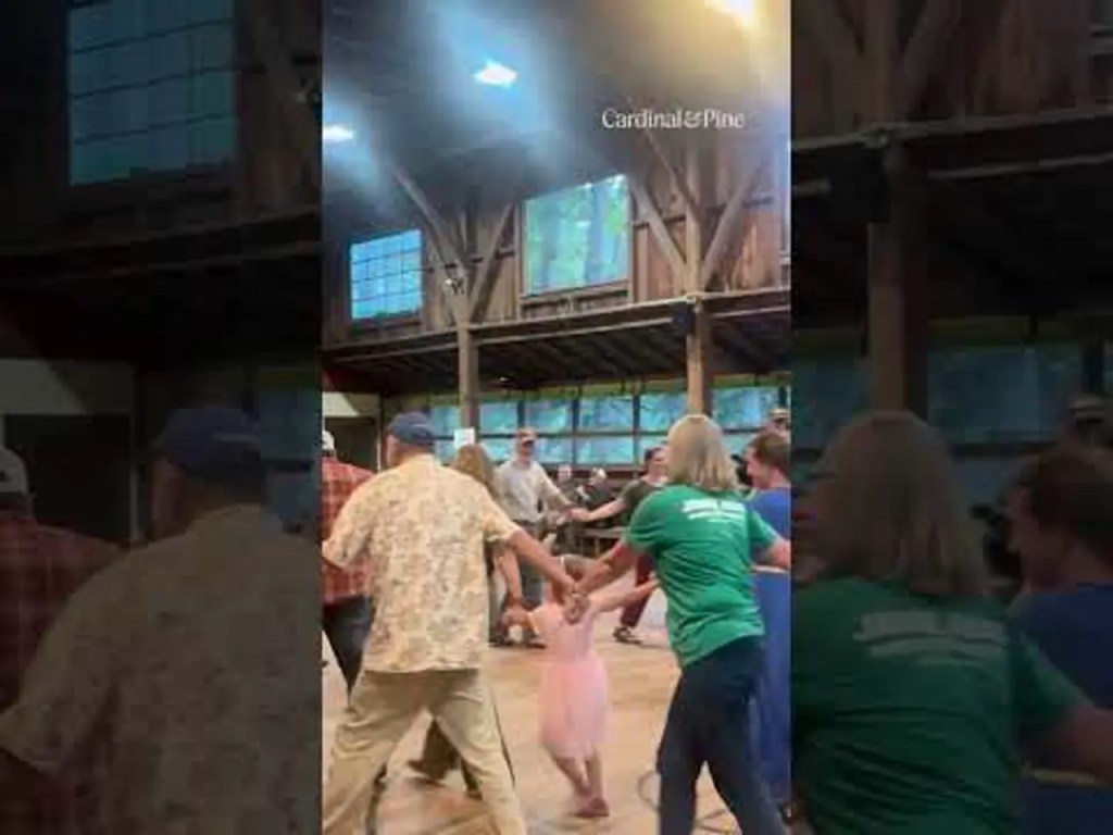 Congressional candidate Jamie Ager leads a barn dance in Henderson County