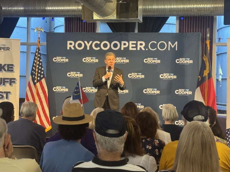 Roy Cooper addressing a crowd of supporters in Greensboro.